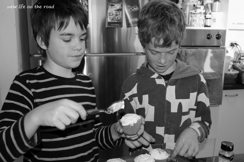 Cameron and Kyle making cupcakes