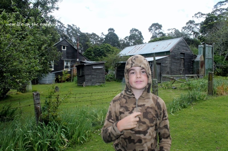 Cameron in front of the Farm House