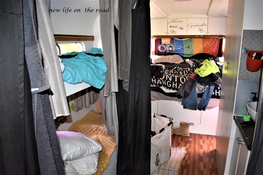 BUNK BEDS AND OUR BED WITHOUT ANY BEDROOM DOOR